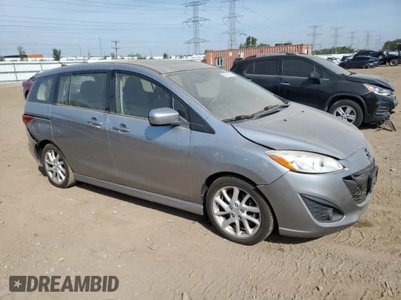 ✅ 2012 Mazda 5 Grand Touring • VIN: JM1CW2DL4C0133148 • Лот: 80471575. Опубликован ранее на Copart с пробегом 92 392 миль. Бесплатный доступ к архиву аукционных продаж из США и подробный отчёт об истории автомобиля на DreamBid. Изображение 4.