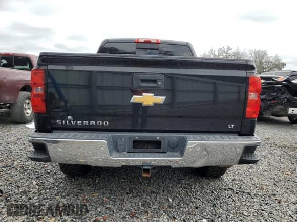 2017 Chevrolet Silverado 1500 LT с VIN 3GCUKREC4HG147657, выставлен на аукционе Copart как лот 82786205 с пробегом 163 857 миль миль и Списание • Salvage title. История ставок и продаж доступна на DreamBid. Изображение 6.