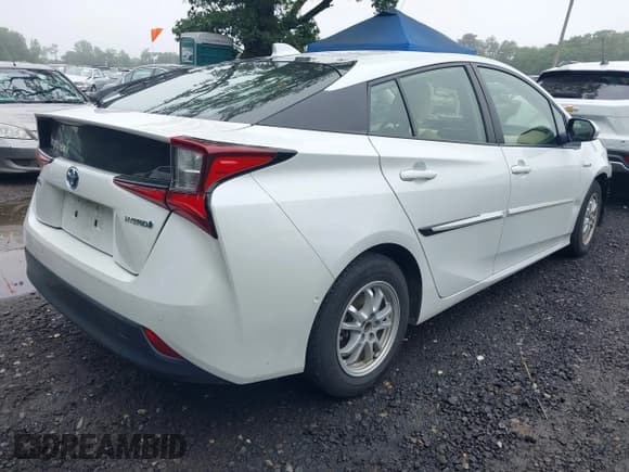 ✅ 2022 Toyota Prius L Eco • VIN: JTDKAMFU2N3167148 • Lot: 42534666. Listed on IAAI with 92,890 mi. Free auction sales archive from the USA and detailed vehicle history report at DreamBid. Image 4.
