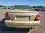 ✅ 2003 Mazda Protege DX • VIN: JM1BJ225631193019 • Lot: 81088365. Listed on Copart with 128,031 mi. Free auction sales archive from the USA and detailed vehicle history report at DreamBid. Image 6.