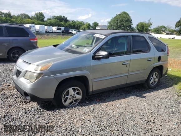 ✅ 2003 Pontiac Aztek • VIN: 3G7DA03E83S574945 • Lot: 65606935. Listed on Copart with 145,318 mi. Free auction sales archive from the USA and detailed vehicle history report at DreamBid. Image 1.