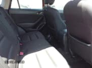 ✅ 2014 Mazda CX-5 Touring • VIN: JM3KE4CY5E0318214 • Lot: 42252680. Wystawiony na IAAI z przebiegiem 102 255 mil. Bezpłatny archiwum sprzedaży aukcyjnych z USA i szczegółowy raport historii pojazdu na DreamBid. Zdjęcie 8.