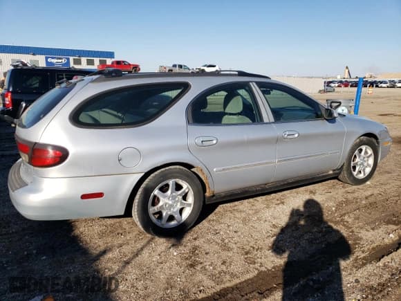 ✅ 2000 Mercury Sable GS • VIN: 1MEFM58U6YA612226 • Лот: 80107064. Опубликован ранее на Copart с пробегом 186 885 миль. Бесплатный доступ к архиву аукционных продаж из США и подробный отчёт об истории автомобиля на DreamBid. Изображение 3.
