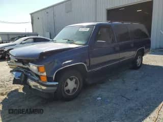 1999 Chevrolet Suburban с VIN 1GNEC16RXXJ381103, выставлен на аукционе Copart как лот 80702955 с пробегом 169 904 миль миль и Списание • Salvage title. История ставок и продаж доступна на DreamBid. Изображение 1.