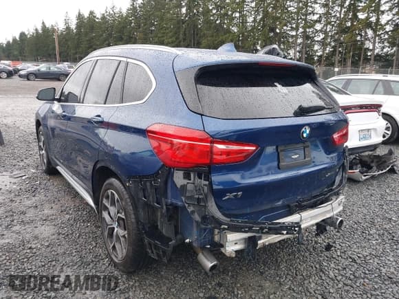 ✅ 2022 BMW X1 xDrive28i • VIN: WBXJG9C09N5V21019 • Lot: 41582490. Listed on IAAI with 21,514 mi. Free auction sales archive from the USA and detailed vehicle history report at DreamBid. Image 3.