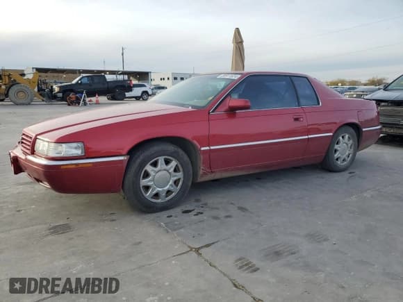 ✅ 1998 Cadillac Eldorado Touring • VIN: 1G6ET1291WU601906 • Лот: 84911624. Опубликован ранее на Copart с пробегом 84 489 миль. Бесплатный доступ к архиву аукционных продаж из США и подробный отчёт об истории автомобиля на DreamBid. Изображение 1.