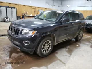 ✅ 2015 Jeep Grand Cherokee Laredo • VIN: 1C4RJFAG0FC142360 • Lot: 63558915. Listed on Copart with 129,294 mi. Free auction sales archive from the USA and detailed vehicle history report at DreamBid. Image 1.