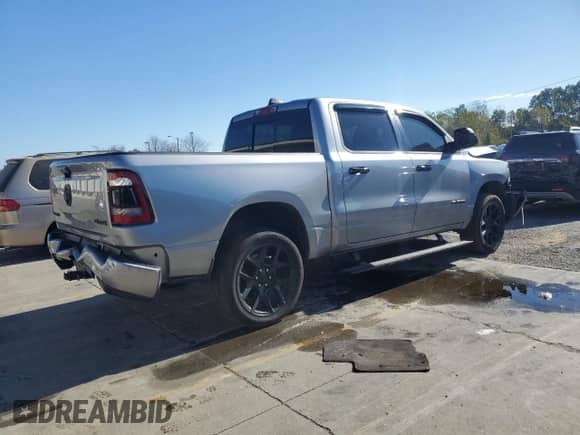 2023 Ram 1500 Laramie with VIN 1C6SRFJT4PN611275, listed as a Copart auction lot 86679465 with 43,003 mi miles and Salvage title. Bid and sale history available at DreamBid. Image 3.
