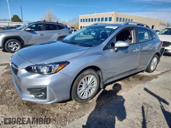 ✅ 2017 Subaru Impreza Premium • VIN: 4S3GTAB65H3751683 • Lot: 91427375. Listed on Copart with 59,979 mi. Free auction sales archive from the USA and detailed vehicle history report at DreamBid. Image 1.