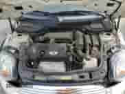 2013 MINI Hardtop z VIN WMWSU3C50DT683566, wystawiony jako Copart lot #59854505 z przebiegiem 136 288 mil mil oraz Szkoda całkowita • Salvage title. Historia ofert i sprzedaży dostępna na DreamBid. Obrazek 11.