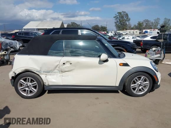 ✅ 2012 MINI Convertible • VIN: WMWZN3C53CT134194 • Lot: 42261686. Listed on IAAI with 104,099 mi. Free auction sales archive from the USA and detailed vehicle history report at DreamBid. Image 13.