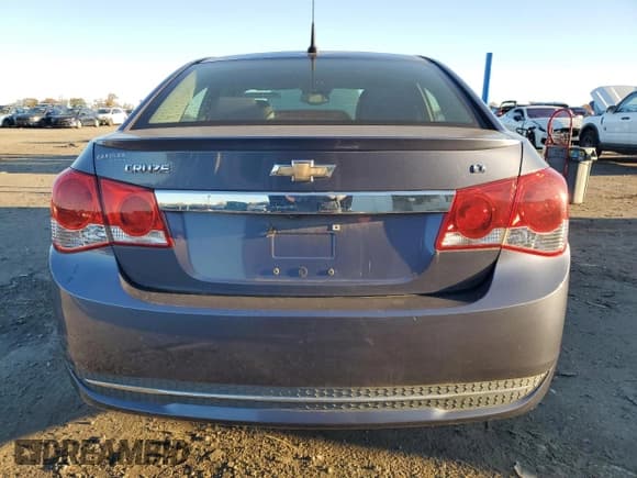 ✅ 2014 Chevrolet Cruze 1LT • VIN: 1G1PC5SB5E7352449 • Лот: 90703335. Опубликован ранее на Copart с пробегом 91 823 миль. Бесплатный доступ к архиву аукционных продаж из США и подробный отчёт об истории автомобиля на DreamBid. Изображение 6.