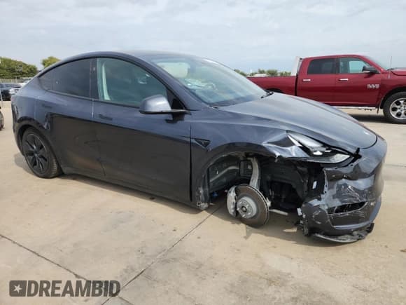 ✅ 2024 Tesla Model Y Long Range • VIN: 7SAYGDEE5RA301100 • Lot: 82557995. Listed on Copart with 22,288 mi. Free auction sales archive from the USA and detailed vehicle history report at DreamBid. Image 4.