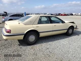 ✅ 1992 Cadillac Seville • VIN: 1G6KS53B0NU837105 • Lot: 55865205. Wystawiony na Copart z przebiegiem 94 740 mil. Bezpłatny archiwum sprzedaży aukcyjnych z USA i szczegółowy raport historii pojazdu na DreamBid. Zdjęcie 3.