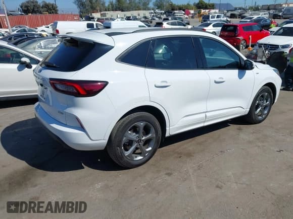 ✅ 2023 Ford Escape ST-Line Select • VIN: 1FMCU9NZ5PUA79645 • Лот: 43188797. Опубликован ранее на IAAI с пробегом 26 698 миль. Бесплатный доступ к архиву аукционных продаж из США и подробный отчёт об истории автомобиля на DreamBid. Изображение 4.