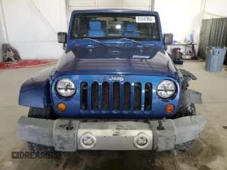 ✅ 2009 Jeep Wrangler Sahara • VIN: 1J4FA54189L721227 • Лот: 91247065. Опубликован ранее на Copart с пробегом 191 846 миль. Бесплатный доступ к архиву аукционных продаж из США и подробный отчёт об истории автомобиля на DreamBid. Изображение 5.
