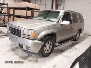 ✅ 1999 Cadillac Escalade • VIN: 1GYEK13RXXR413480 • Lot: 41552688. Listed on IAAI with 214,501 mi. Free auction sales archive from the USA and detailed vehicle history report at DreamBid. Image 2.