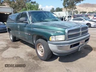 ✅ 2000 Dodge 1500 • VIN: 3B7HC13Y1YG106661 • Lot: 43276502. Listed on IAAI with 227,249 mi. Free auction sales archive from the USA and detailed vehicle history report at DreamBid. Image 1.