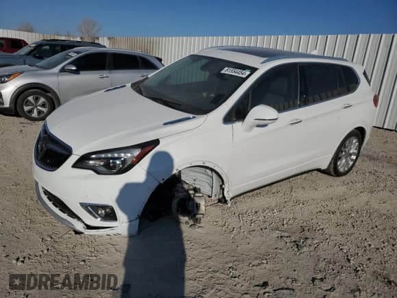 ✅ 2019 Buick Envision Premium II • VIN: LRBFX4SX2KD004651 • Лот: 81554454. Опубликован ранее на Copart с пробегом 52 860 миль. Бесплатный доступ к архиву аукционных продаж из США и подробный отчёт об истории автомобиля на DreamBid. Изображение 1.
