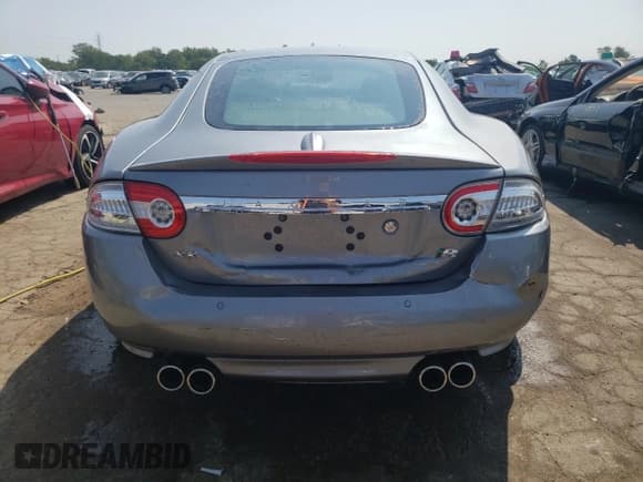 ✅ 2010 Jaguar XK XKR • VIN: SAJWA4DC2AMB34042 • Лот: 65043694. Опубликован ранее на Copart с пробегом Не указан. Бесплатный доступ к архиву аукционных продаж из США и подробный отчёт об истории автомобиля на DreamBid. Изображение 6.