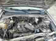 2006 Mercury Mariner Luxury z VIN 4M2CU56196KJ17209, wystawiony jako Copart lot #58450665 z przebiegiem 239 728 mil mil oraz Szkoda całkowita • Salvage title. Historia ofert i sprzedaży dostępna na DreamBid. Obrazek 12.