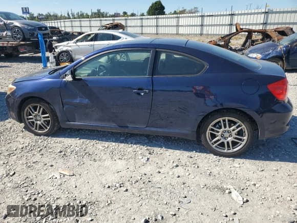 ✅ 2007 Scion tC Spec • VIN: JTKDE167970184290 • Lot: 71657055. Listed on Copart with 170,689 mi. Free auction sales archive from the USA and detailed vehicle history report at DreamBid. Image 2.