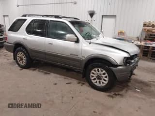 ✅ 2000 Honda Passport LX • VIN: 4S6DM58W4Y4410139 • Лот: 41488570. Опубликован ранее на IAAI с пробегом 154 121 миль. Бесплатный доступ к архиву аукционных продаж из США и подробный отчёт об истории автомобиля на DreamBid. Изображение 1.