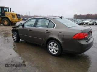 ✅ 2009 Kia Optima LX • VIN: KNAGE228195305969 • Лот: 62738804. Опубликован ранее на Copart с пробегом 171 801 миль. Бесплатный доступ к архиву аукционных продаж из США и подробный отчёт об истории автомобиля на DreamBid. Изображение 2.