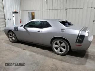 ✅ 2013 Dodge Challenger R/T • VIN: 2C3CDYBT2DH653569 • Lot: 62762874. Wystawiony na Copart z przebiegiem 161 726 mil. Bezpłatny archiwum sprzedaży aukcyjnych z USA i szczegółowy raport historii pojazdu na DreamBid. Zdjęcie 2.