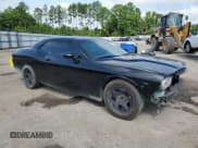 ✅ 2013 Dodge Challenger SXT • VIN: 2C3CDYAG4DH695150 • Lot: 63113394. Wystawiony na Copart z przebiegiem 137 022 mil. Bezpłatny archiwum sprzedaży aukcyjnych z USA i szczegółowy raport historii pojazdu na DreamBid. Zdjęcie 4.