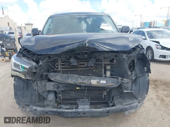 ✅ 2018 Infiniti QX80 • VIN: JN8AZ2ND3J9840423 • Lot: 43394840. Listed on IAAI with 128,180 mi. Free auction sales archive from the USA and detailed vehicle history report at DreamBid. Image 13.