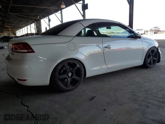 ✅ 2012 Volkswagen Eos Komfort • VIN: WVWBW7AH4CV000014 • Lot: 73323064. Listed on Copart with 150,087 mi. Free auction sales archive from the USA and detailed vehicle history report at DreamBid. Image 3.