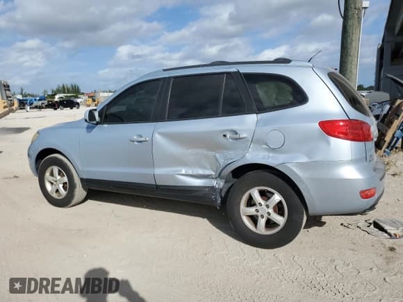 ✅ 2007 Hyundai Santa Fe GLS • VIN: 5NMSG13D67H080505 • Лот: 80870704. Опубликован ранее на Copart с пробегом 171 281 миль. Бесплатный доступ к архиву аукционных продаж из США и подробный отчёт об истории автомобиля на DreamBid. Изображение 2.