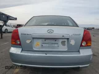 2004 Hyundai Accent GL z VIN KMHCG45C34U567915, wystawiony jako Copart lot #43654985 z przebiegiem 141 461 mil mil oraz Czysty tytuł • Clean title. Historia ofert i sprzedaży dostępna na DreamBid. Obrazek 6.