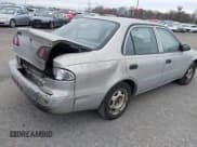 ✅ 1999 Toyota Corolla VE • VIN: 2T1BR12E1XC128924 • Lot: 43671058. Listed on IAAI with 270,679 mi. Free auction sales archive from the USA and detailed vehicle history report at DreamBid. Image 4.