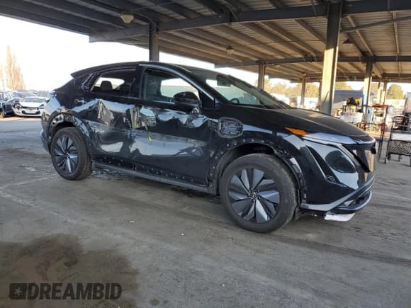 ✅ 2023 Nissan ARIYA Engage • VIN: JN1AF0BA1PM409901 • Lot: 48465295. Listed on Copart with 13,255 mi. Free auction sales archive from the USA and detailed vehicle history report at DreamBid. Image 4.