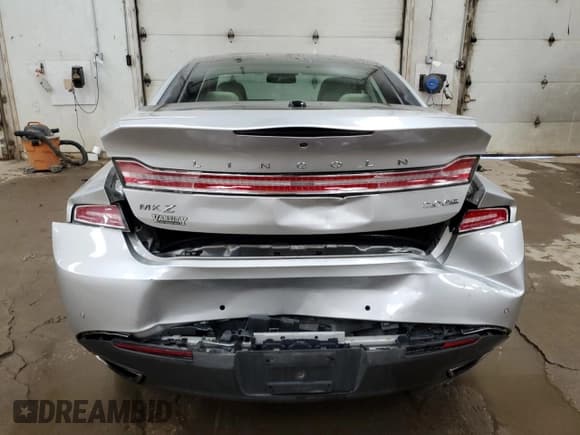 ✅ 2015 Lincoln MKZ • VIN: 3LN6L2J9XFR623267 • Lot: 84400935. Wystawiony na Copart z przebiegiem 122 625 mil. Bezpłatny archiwum sprzedaży aukcyjnych z USA i szczegółowy raport historii pojazdu na DreamBid. Zdjęcie 6.