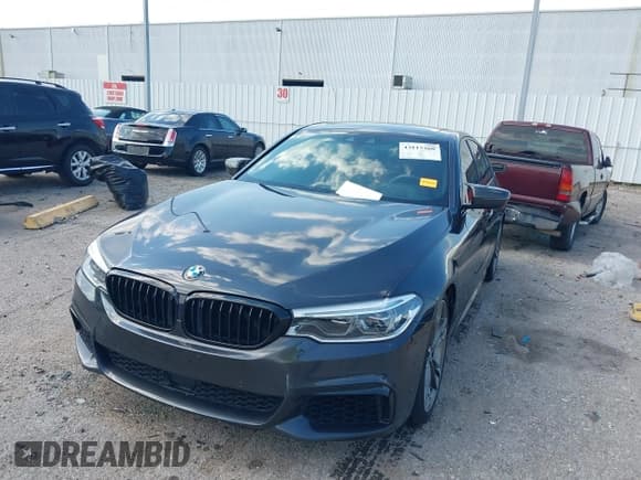 ✅ 2020 BMW 5 Series M550i xDrive • VIN: WBAJS7C07LCD20695 • Лот: 43115260. Опубликован ранее на IAAI с пробегом 82 431 миль. Бесплатный доступ к архиву аукционных продаж из США и подробный отчёт об истории автомобиля на DreamBid. Изображение 6.