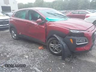 2021 Hyundai Kona SE z VIN KM8K1CAA1MU666549, wystawiony jako IAAI lot #43256036 z przebiegiem 156 968 mil mil oraz . Historia ofert i sprzedaży dostępna na DreamBid. Obrazek 1.