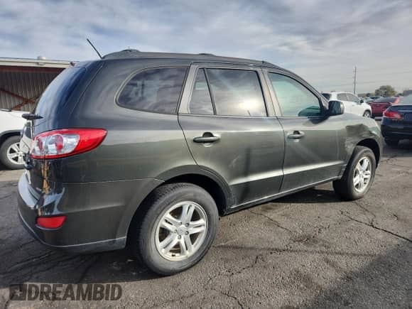 2012 Hyundai Santa Fe GLS с VIN 5XYZGDAB4CG139105, выставлен на аукционе Copart как лот 91242605 с пробегом 157 845 миль миль и Чистый • Clean title. История ставок и продаж доступна на DreamBid. Изображение 3.
