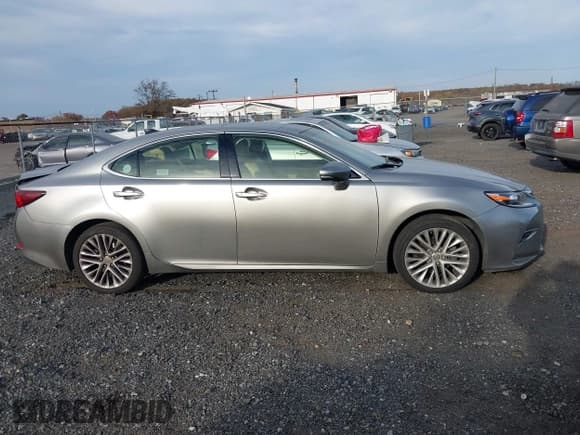 ✅ 2016 Lexus ES 330 • VIN: JTHBK1GG1G2232938 • Lot: 43618097. Listed on IAAI with 146,745 mi. Free auction sales archive from the USA and detailed vehicle history report at DreamBid. Image 13.