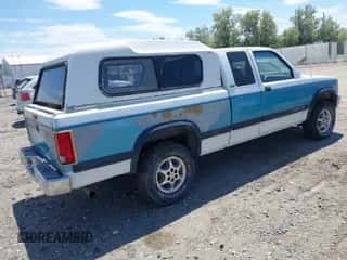 1996 Dodge Dakota z VIN 1B7GG23X5TS523974, wystawiony jako IAAI lot #42430916 z przebiegiem 189 216 mil mil oraz . Historia ofert i sprzedaży dostępna na DreamBid. Obrazek 4.