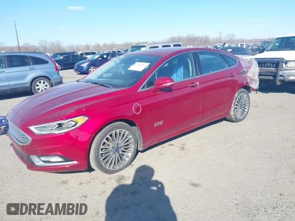 ✅ 2018 Ford Fusion Titanium • VIN: 3FA6P0SU3JR106441 • Lot: 41699936. Listed on IAAI with 146,330 mi. Free auction sales archive from the USA and detailed vehicle history report at DreamBid. Image 17.