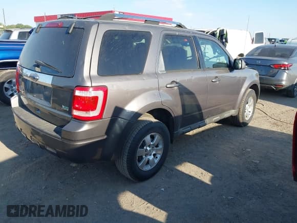 ✅ 2011 Ford Escape Limited • VIN: 1FMCU0EG7BKB26916 • Lot: 42053161. Wystawiony na IAAI z przebiegiem 194 669 mil. Bezpłatny archiwum sprzedaży aukcyjnych z USA i szczegółowy raport historii pojazdu na DreamBid. Zdjęcie 4.