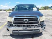 ✅ 2013 Toyota Tundra • VIN: 5TFRM5F19DX057061 • Lot: 42563503. Listed on IAAI with 131,848 mi. Free auction sales archive from the USA and detailed vehicle history report at DreamBid. Image 13.