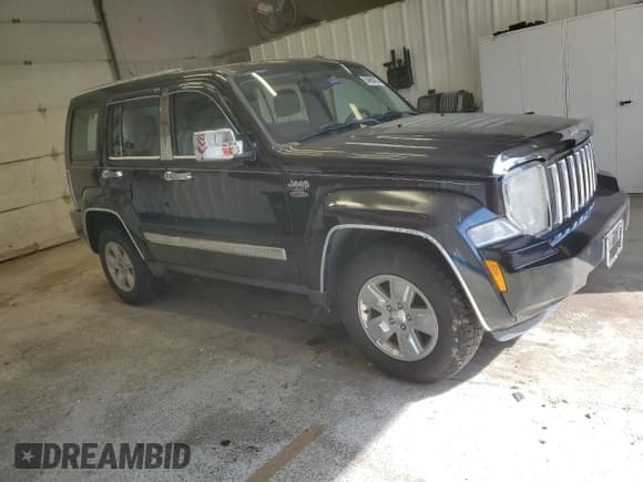 ✅ 2012 Jeep Liberty Arctic • VIN: 1C4PJMAK4CW173007 • Lot: 84800455. Listed on Copart with 125,096 mi. Free auction sales archive from the USA and detailed vehicle history report at DreamBid. Image 4.