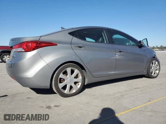 2012 Hyundai Elantra Limited с VIN KMHDH4AE0CU318740, выставлен на аукционе Copart как лот 87480885 с пробегом 145 801 миль миль и Списание • Salvage title. История ставок и продаж доступна на DreamBid. Изображение 3.