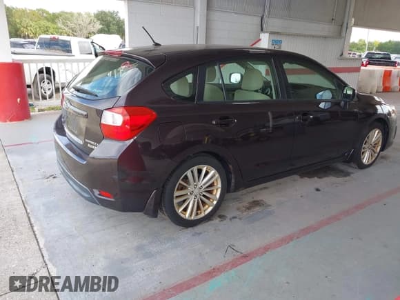 ✅ 2012 Subaru Impreza Premium • VIN: JF1GPAD68CH223218 • Lot: 43262941. Listed on IAAI with 157,211 mi. Free auction sales archive from the USA and detailed vehicle history report at DreamBid. Image 4.