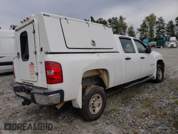 ✅ 2009 Chevrolet Silverado 2500HD Work Truck • VIN: 1GCHC43K59F157421 • Лот: 73585914. Опубликован ранее на Copart с пробегом 243 185 миль. Бесплатный доступ к архиву аукционных продаж из США и подробный отчёт об истории автомобиля на DreamBid. Изображение 3.