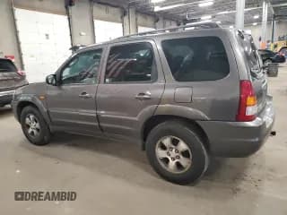 ✅ 2003 Mazda Tribute LX • VIN: 4F2YZ04173KM05549 • Lot: 86702895. Wystawiony na Copart z przebiegiem 128 757 mil. Bezpłatny archiwum sprzedaży aukcyjnych z USA i szczegółowy raport historii pojazdu na DreamBid. Zdjęcie 2.
